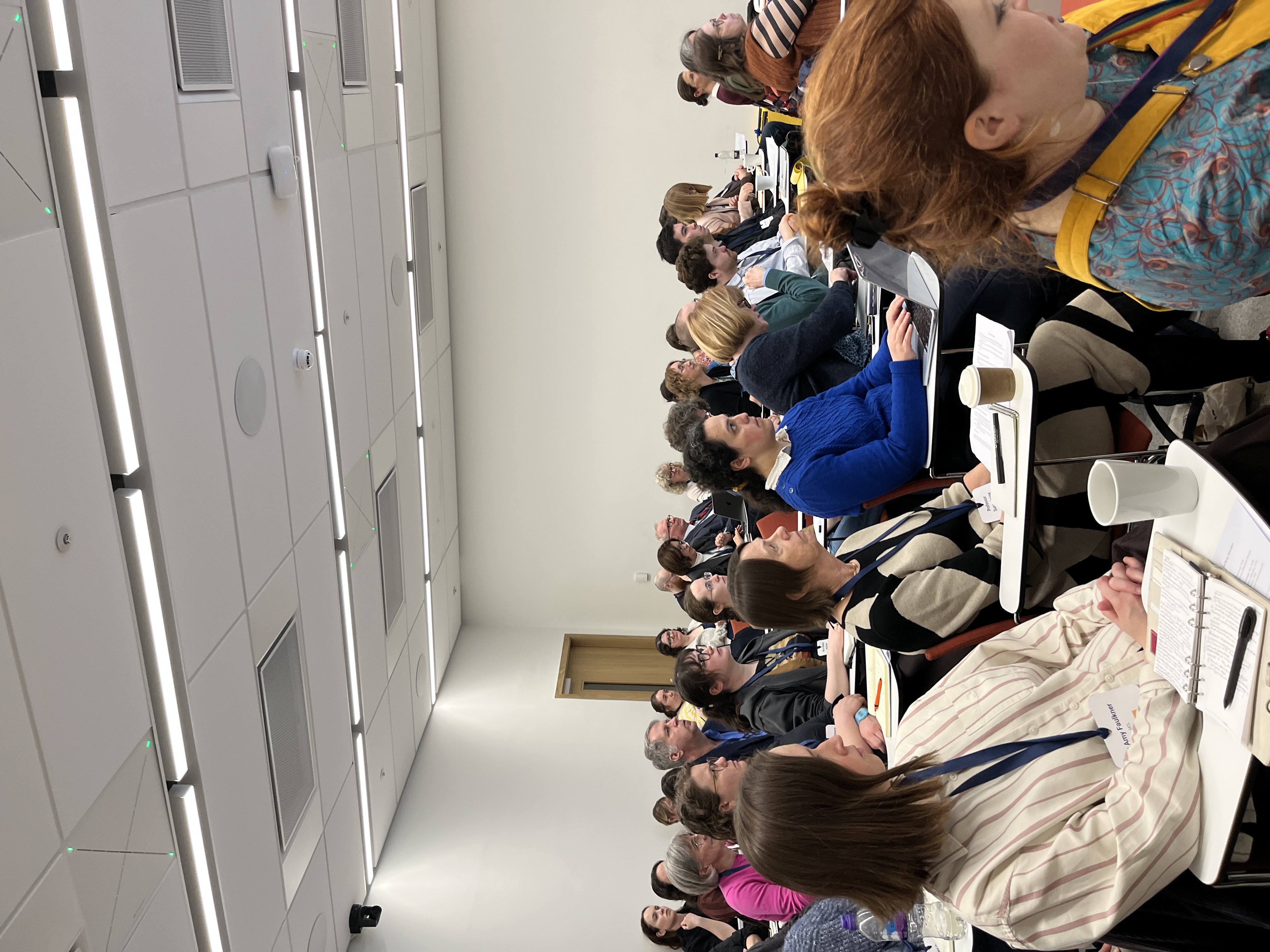 Image of attendees at a conference