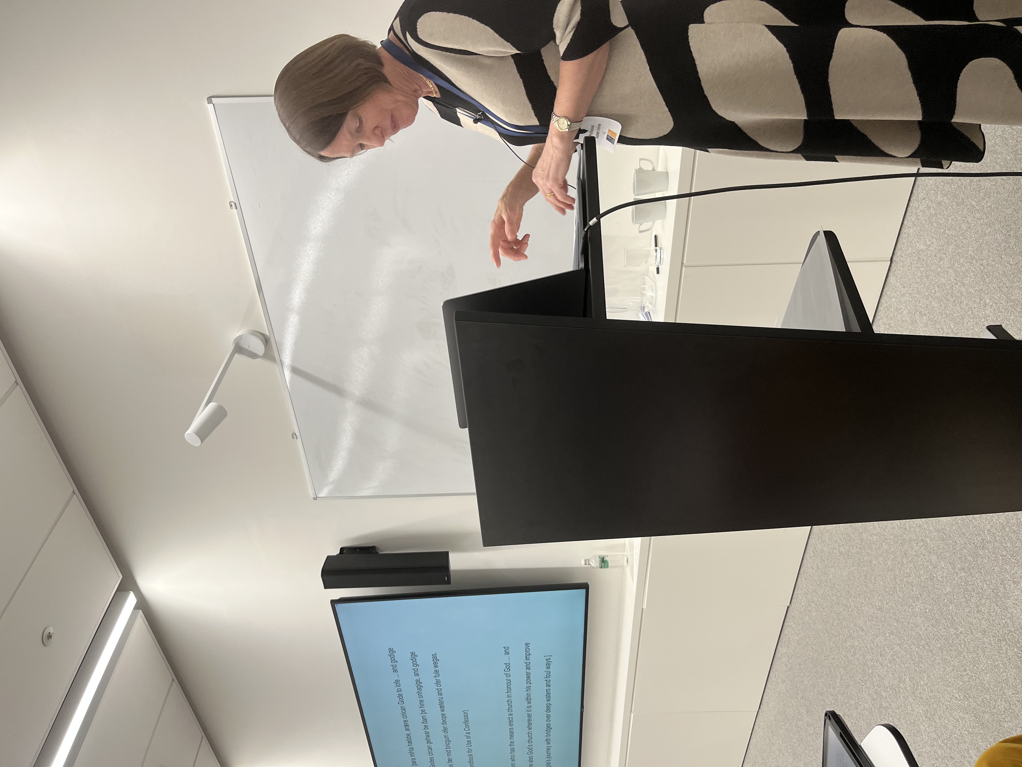 Image of a speaker at podium