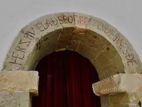 Old English inscription on the porch of an Anglo-Saxon church