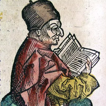 Image of Bede reading a book